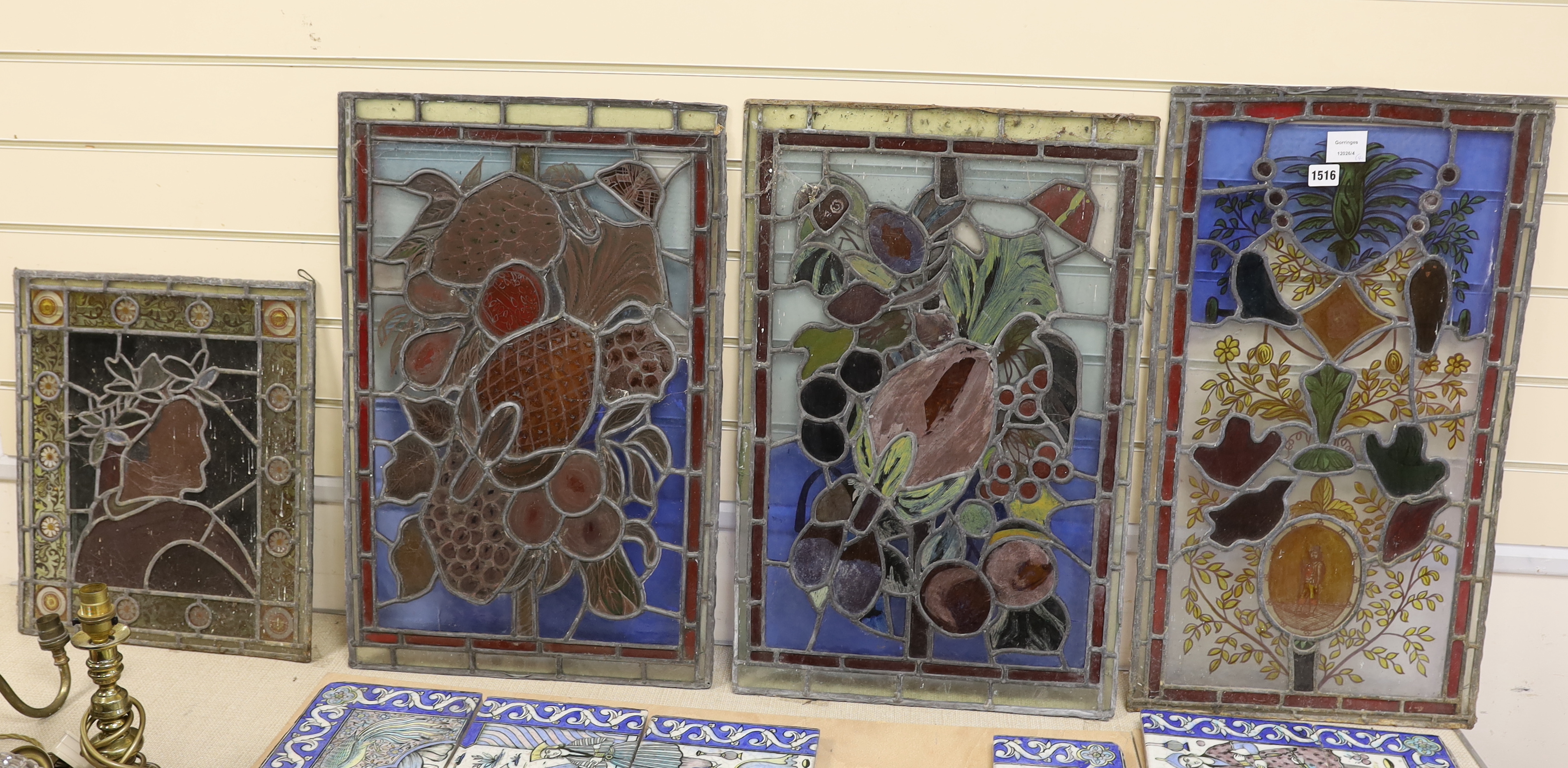 Four Victorian stained glass panels, tallest 70cm high x 39cm wide